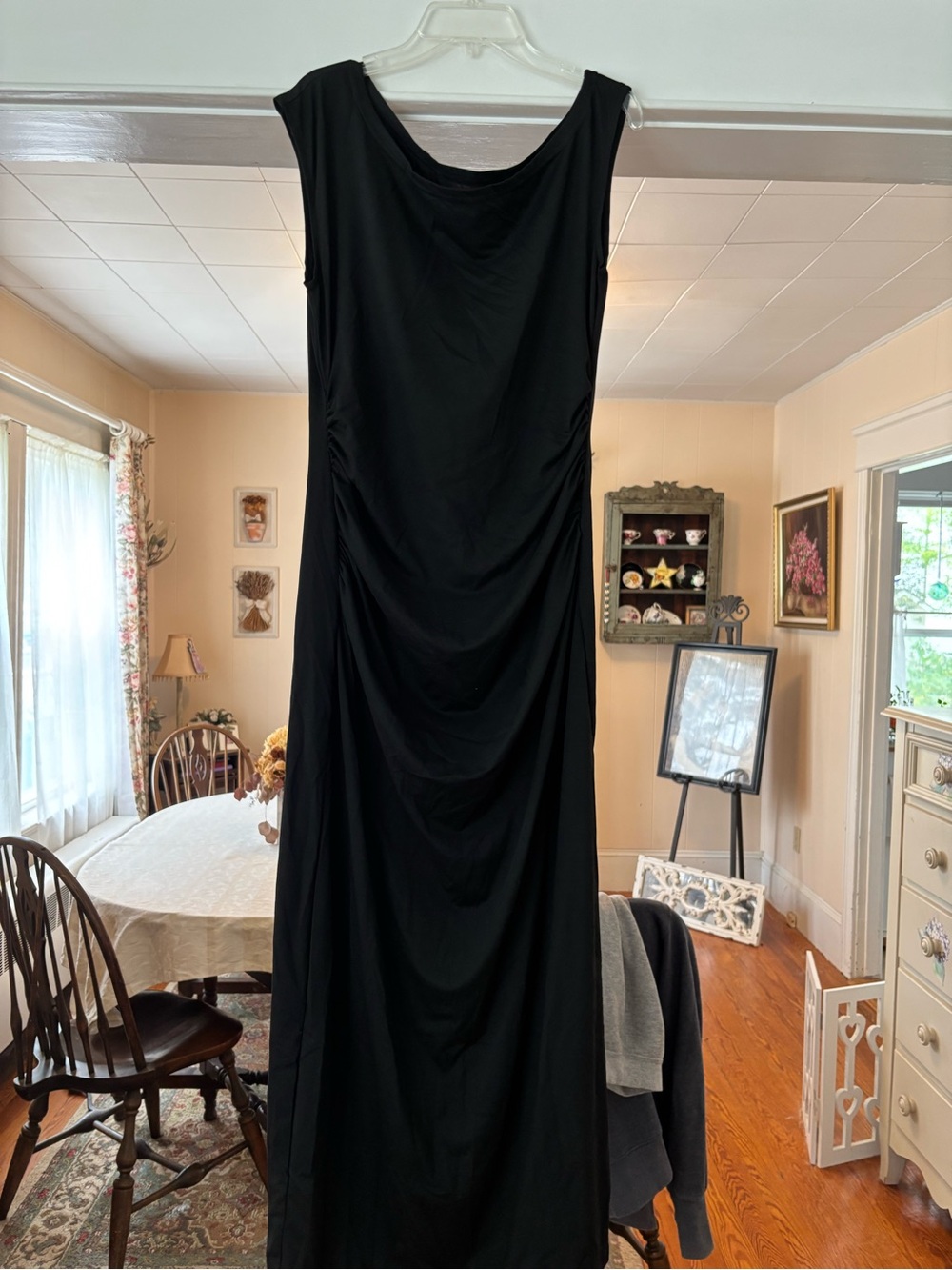 Sleek Black Sleeveless Maxi Dress with Draped Silhouette